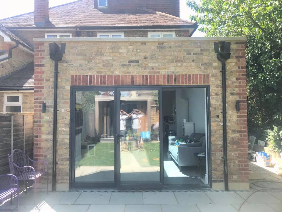 Completed brick extension with bifold doors