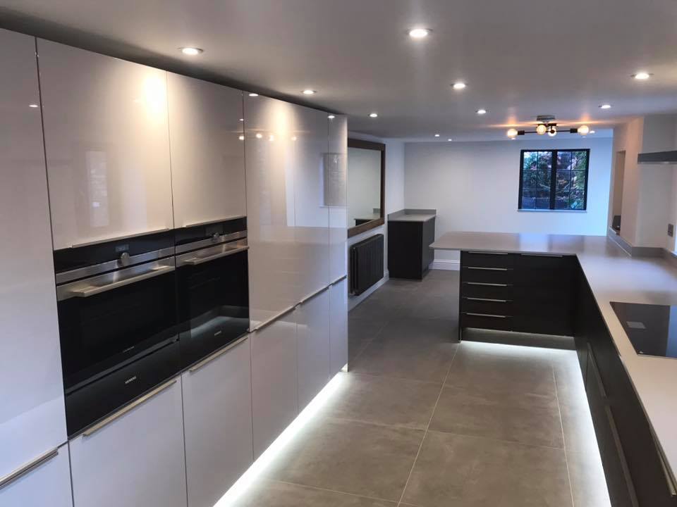 Luxury kitchen with gloss units and LED plinth lighting